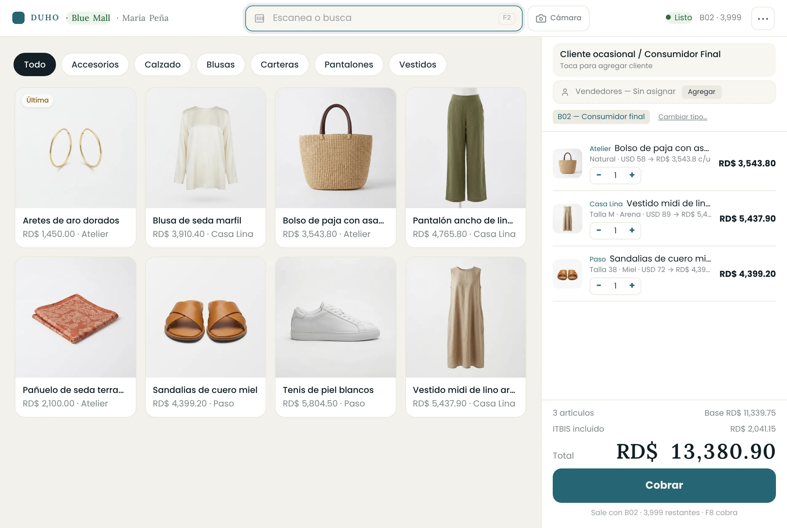 La caja de DUHO en una boutique: productos con foto, tallas y el ticket a la derecha.